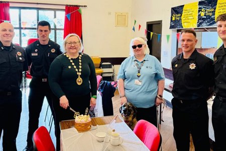 Provost Renwick with firefighter,s Rye and their owner at the fundraiser.