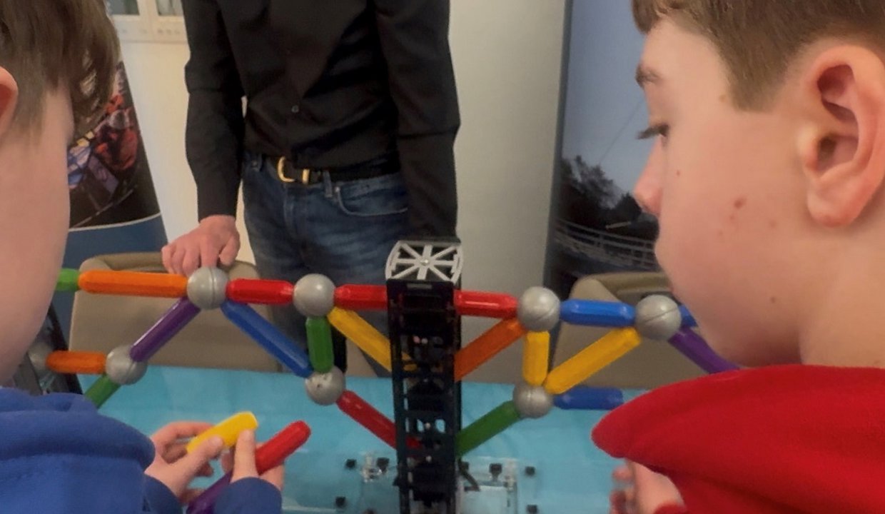 An image of pupils working with magnets