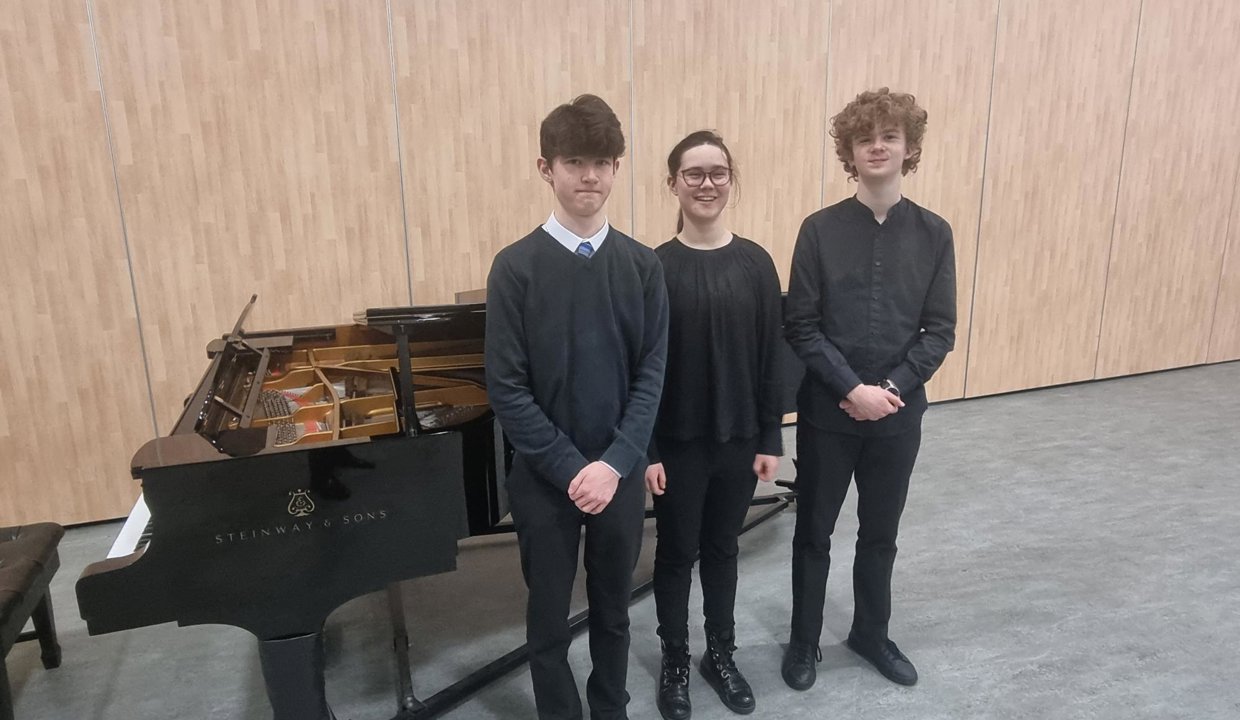 The concert soloist from left to right: Johnny, Gina and Euan