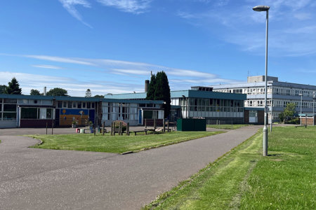 Balmuildy Primary School on a clear blue day