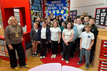 Provost Renwick pictured with pupils from Holy Trinity Primary