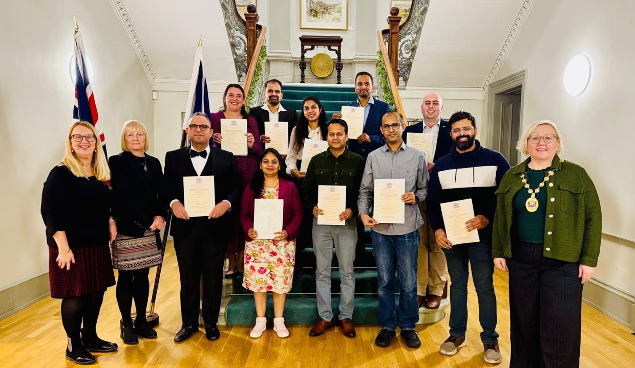 Provost with new citizens at Kilmardinny House