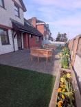 Outside view of property showing bench