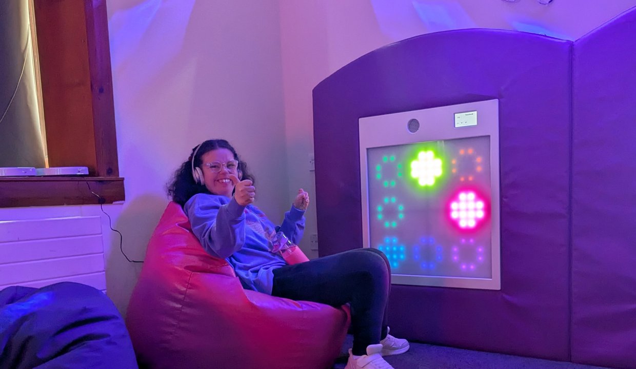 Girl sitting in a sensory room