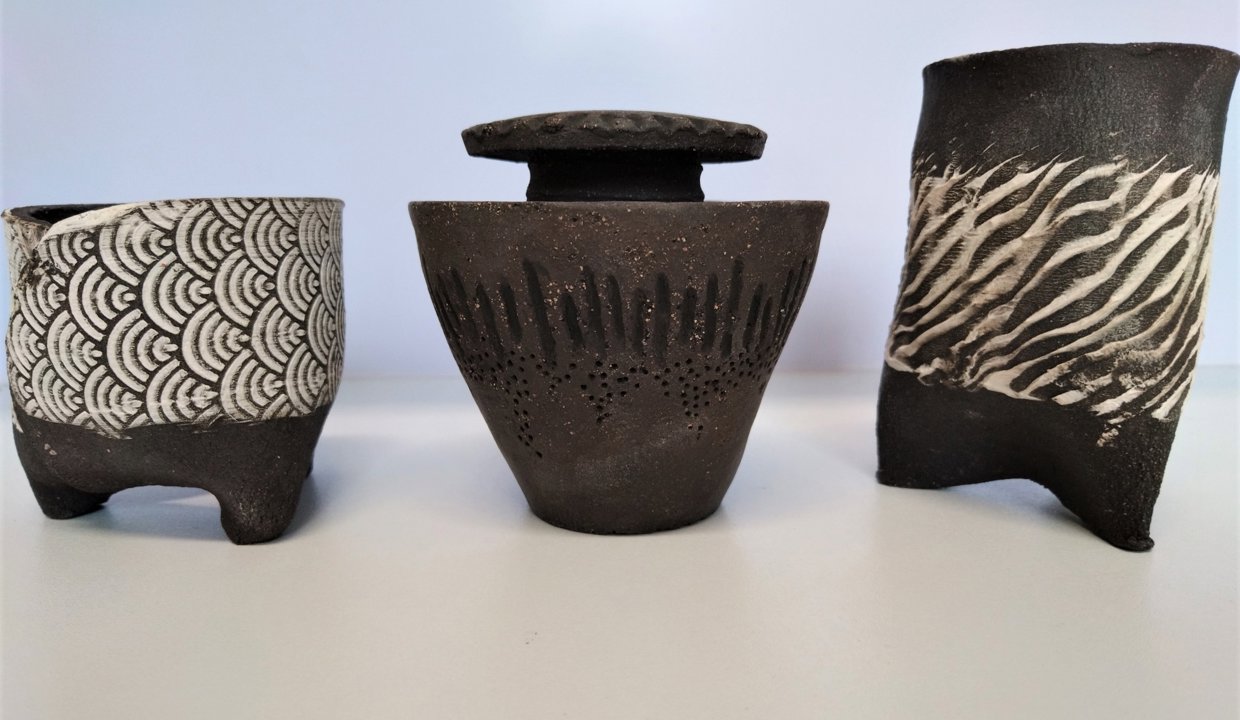 A photo of three items of glazed pottery – part of the exhibits on show at the Auld Kirk