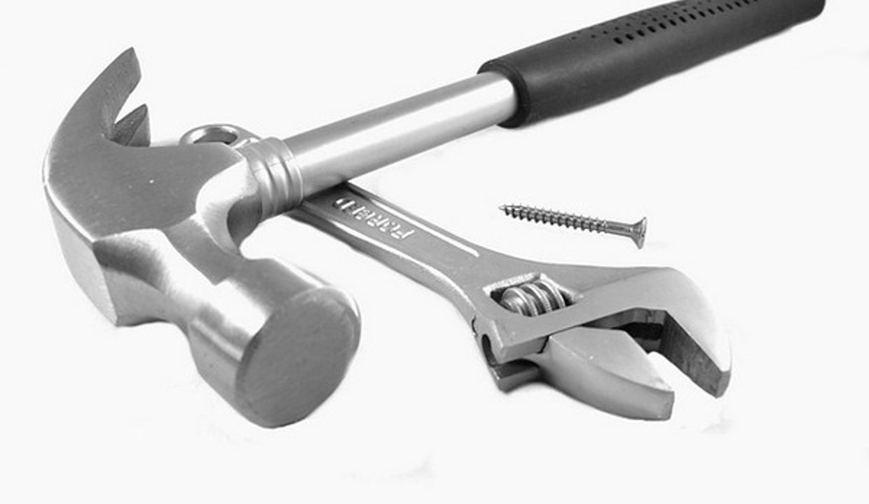 Photo of a hammer and spanner - trade tools