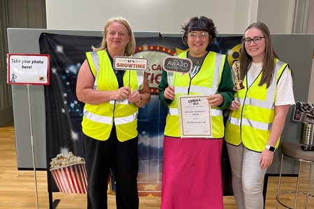 Local Area Coordinators Linda McGavin and Heather McFadyen and Jennifer Brotherston with the club’s Best New Community Cinema 2022 award