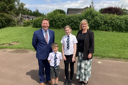 Chief Education Officer, Greg Bremner and Councillor Lynda Williamson pictured with pupils from Balmuildy Primary School during a recent visit to celebrate both the school and the Education Service’s recent glowing inspection reports.