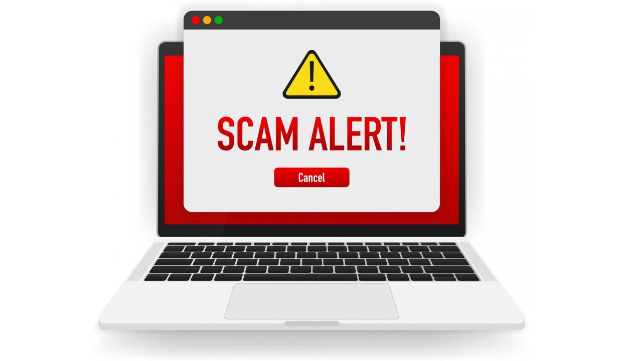 Laptop with a 'scam alert message' on the screen