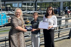 Anna Phin with Provost Renwick (left) and Depute Provost McDiarmid and her award at the Council’s HQ in Kirkintilloch.