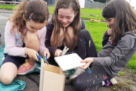 children building birdbox