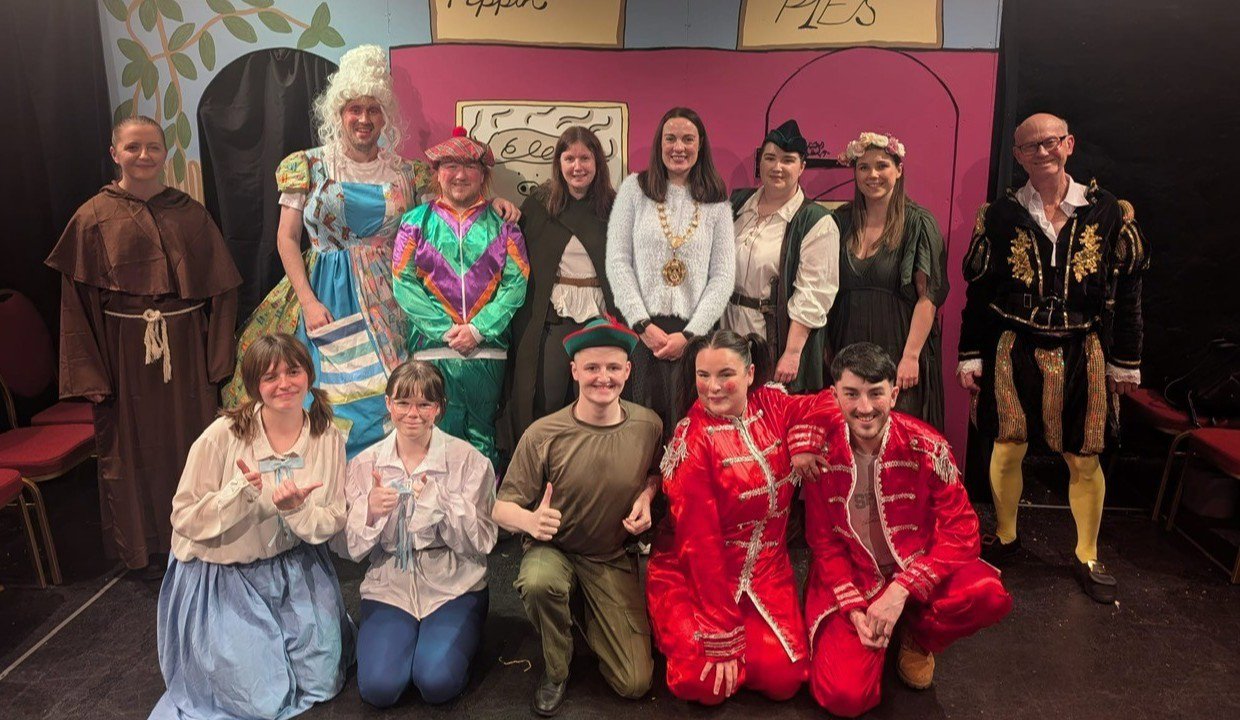 Depute provost and actors in the panto in costume