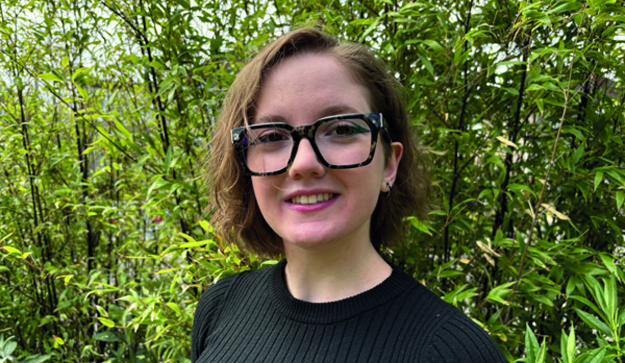 Erika Fenocchi smiling with trees in the background of the shot