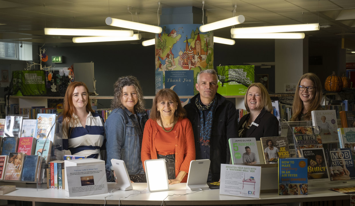 Representatives of the Universities of Glasgow and Edinburgh, the Scottish Libraries & Information Council and the East Dunbartonshire Leisure & Culture Trust with Claire Charlwood (third left).