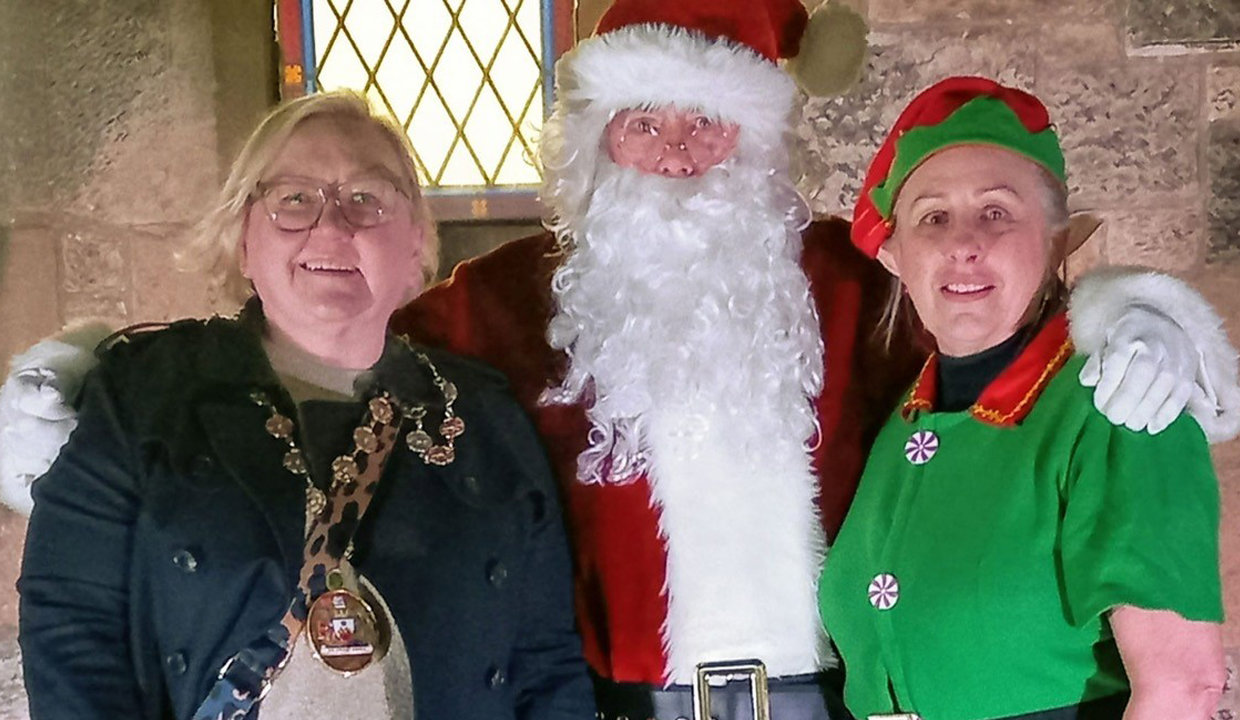 Provost Renwick with Santa and his elf