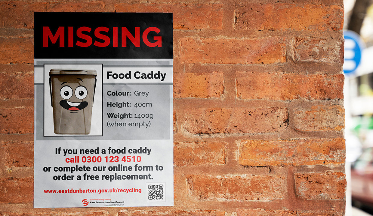 Missing poster on a wall showing a caddy