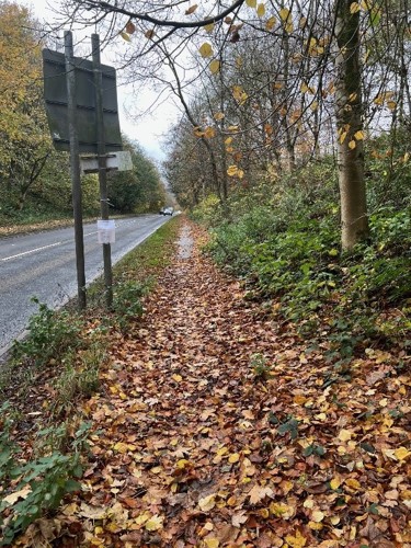 a807 before image showing cars travelling along the road coming up for a road sign