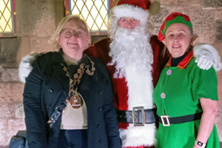Provost Renwick with Santa and his elf