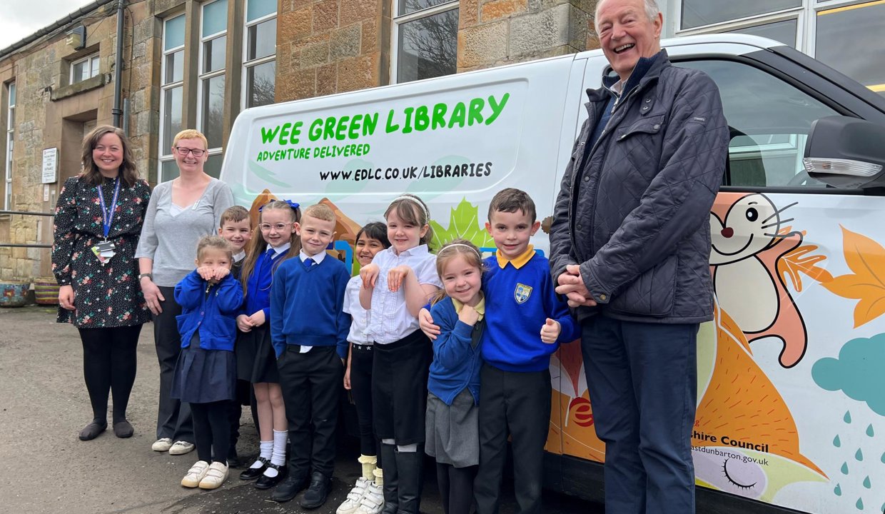 Trust Chair Jim Neill is pictured with pupils at Twechar Primary School, with (from left) teacher Fiona Longstaff and Helen Robertson, Children & Families Co-ordinator for East Dunbartonshire Libraries.