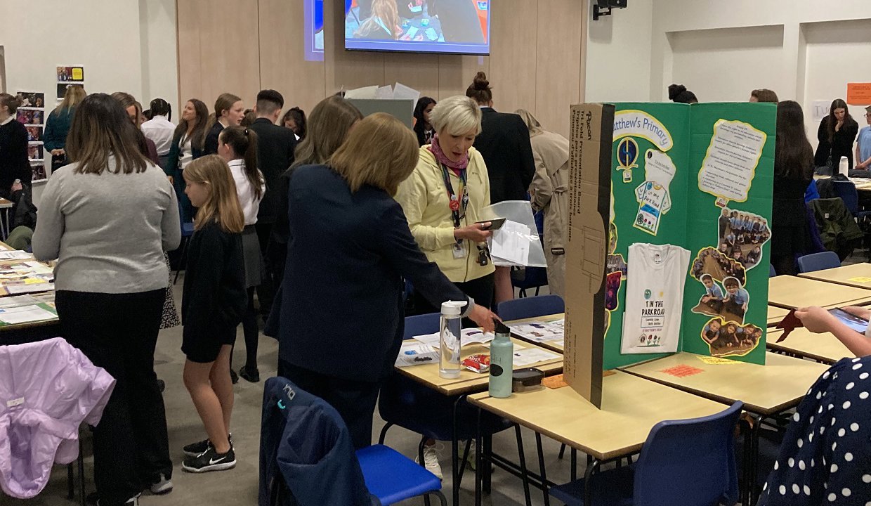 People attending event at Kirkintilloch High School in June 2024.
