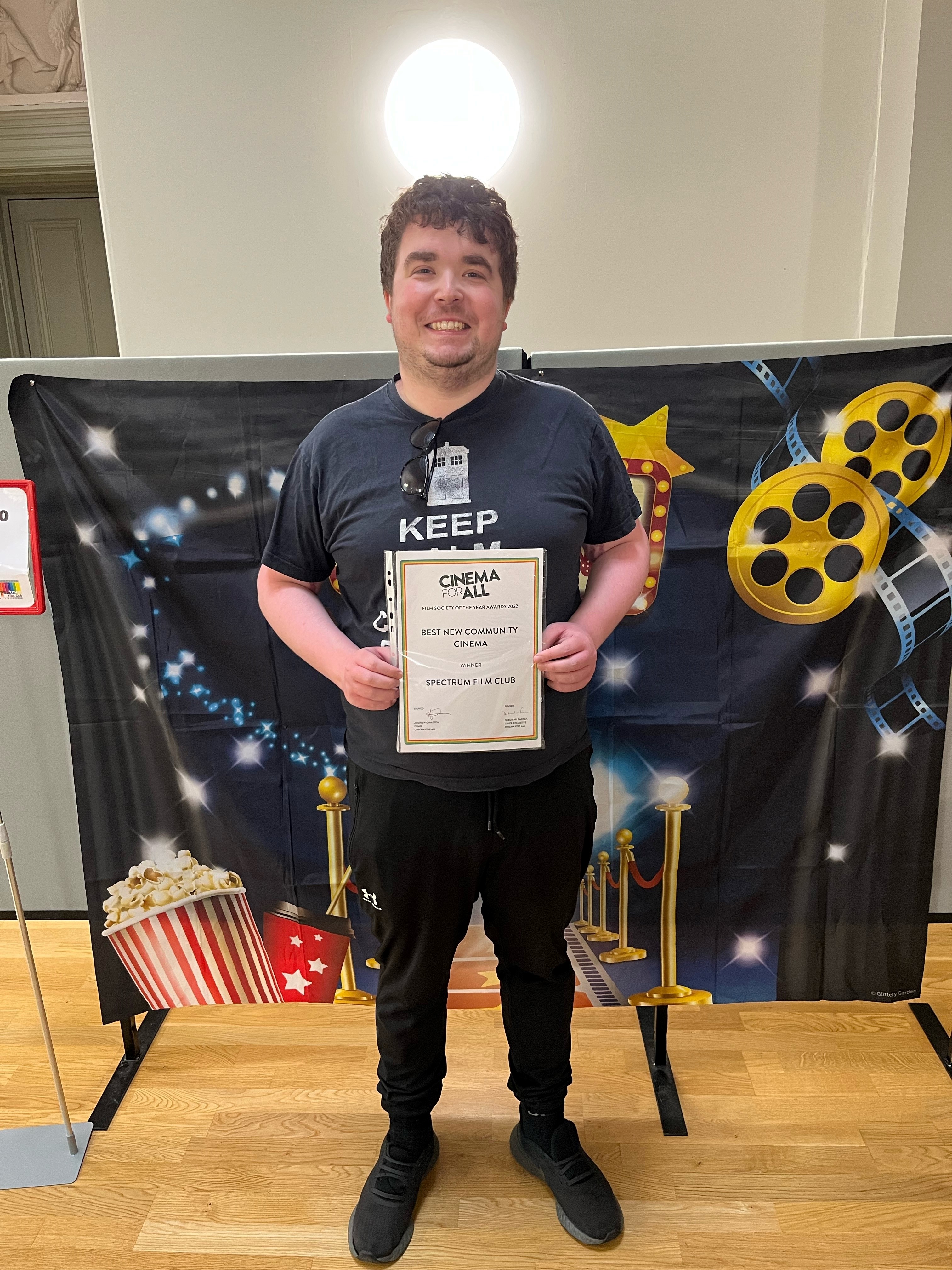 Club spokesperson Ed with the club’s Best New Community Cinema 2022 award
