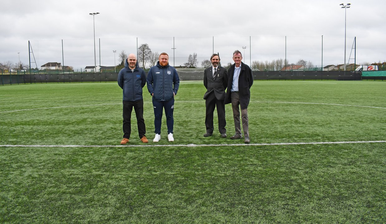 Pictured outside Huntershill Sports Hub are: EDLC Operations Manager Fraser Makeham; Michael Lee, Manager of West Park United FC's men's senior team; Councillor Gordan Low, Leader of the Council; and Councillor Jim Gibbons, Vice Chair of EDLC Trust.