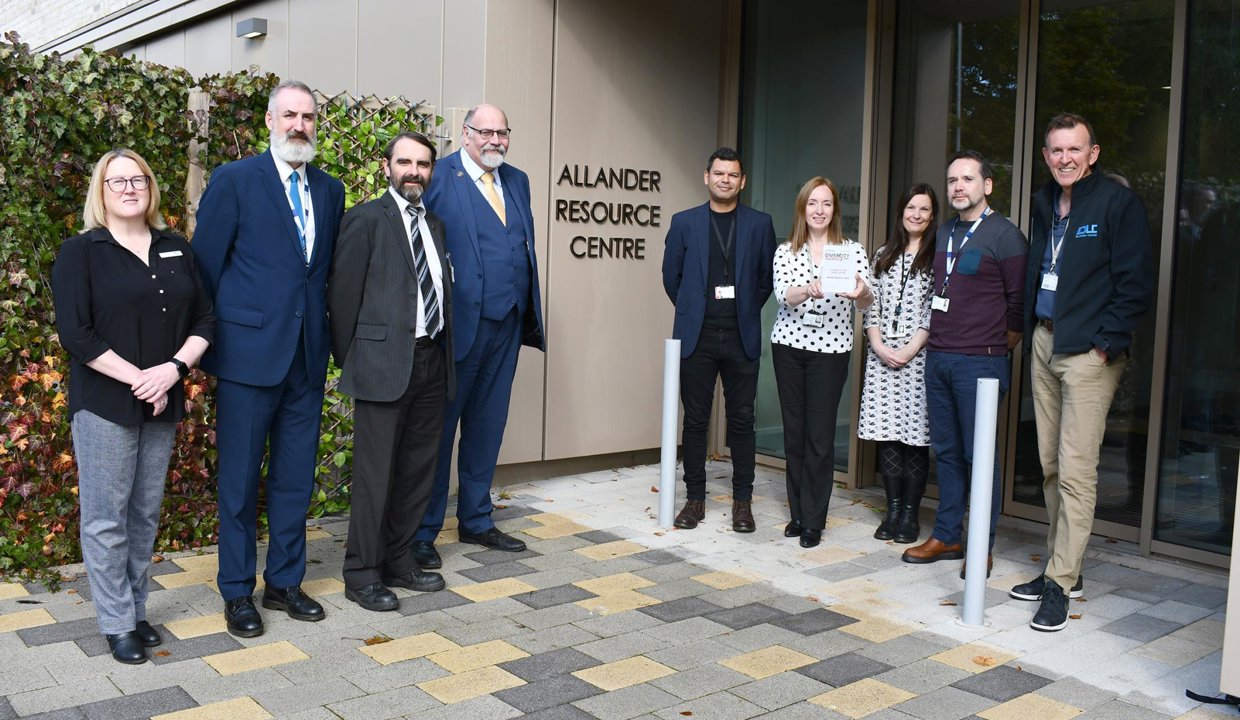 Representatives of East Dunbartonshire Council, Health and Social Care Partnership, and Leisure and Culture Trust are pictured with the award – including Cllr Gordan Low, Leader of the Council (third from left) and Cllr Calum Smith, Chair of EDHSCP (fourth from left).