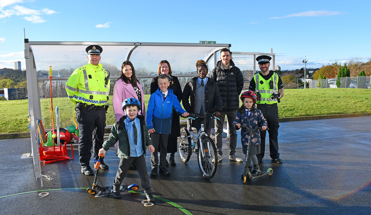  The Headteachers of St Matthew’s Primary School and Wester Cleddens Primary School with two members of the Community Police team and two pupils from each school posing with scooters and bicycles at the launch of the pilot scheme in November 2023.
