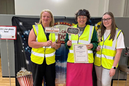 Local Area Coordinators Linda McGavin, Heather McFadyen and Jennifer Brotherston with the Best New Community Cinema 2022 award