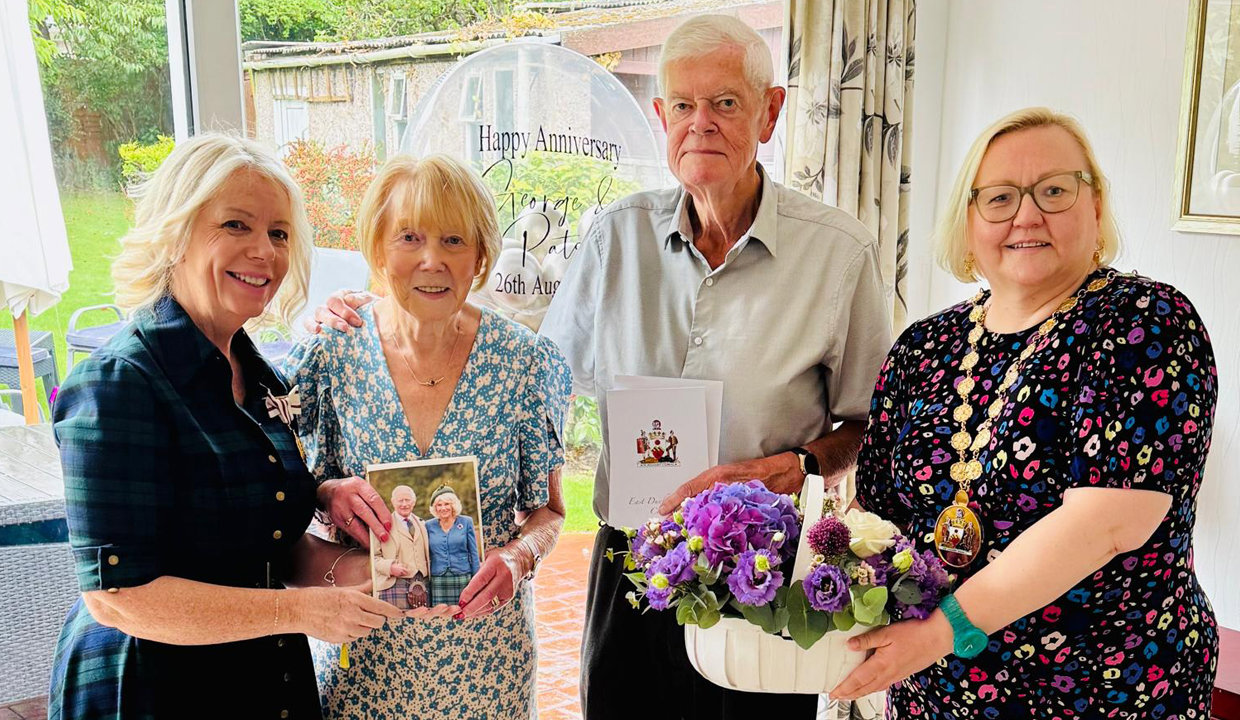 Patsy and George Morris celebrate their Platinum Wedding Anniversary with Deputy Lieutenant Maureen Cummings (left) and Provost Renwick