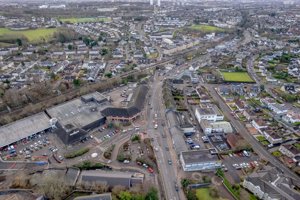 – aerial view of Bishopbriggs town centre, facing south towards the rail station.