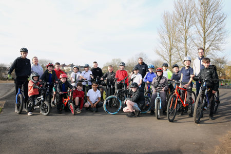 people on bikes on the new pump track