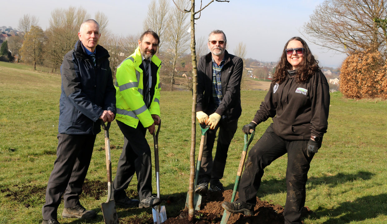 Left to right – Stephen Egan, Team Leader, Streetscene Technical Support, East Dunbartonshire Council Leader Gordan Low, Lorne Campbell, Development Manager of Clyde Climate Forest and Jane McArdle, Greenspace Project Officer planting a crab apple tree in the park.