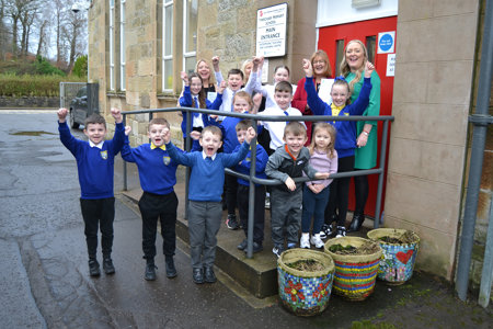 Linda Stewart, Acting Depute Head; Tracy Dodds, Depute Head of Centre; Councillor Williamson and Headteacher Marie-Louise Brogan celebrate with the children.