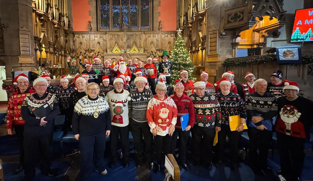 Kirkintilloch Male Voice Choir dressed in christmas jumpers and santa hats
