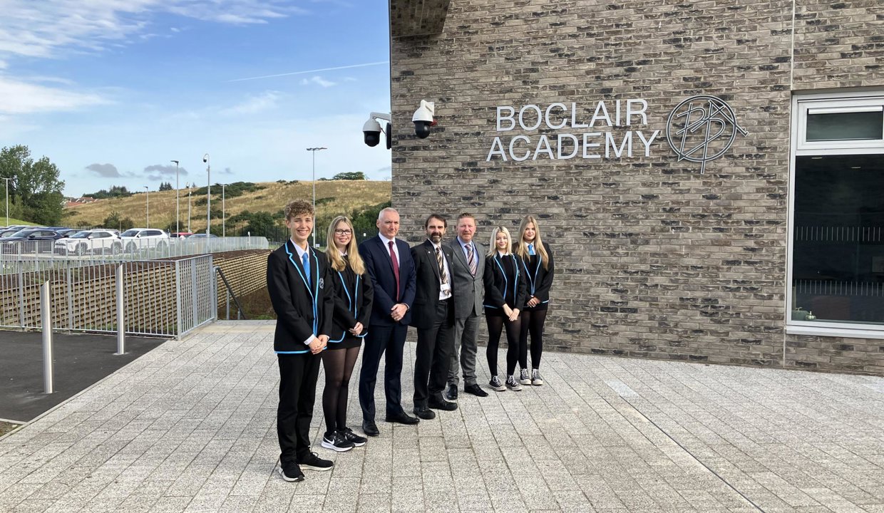 staff and school pupils with councillor