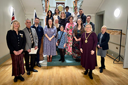 Provost Gillian Renwick and Deputy Lord Lieutenant Margaret Stewart standing with the new citizens
