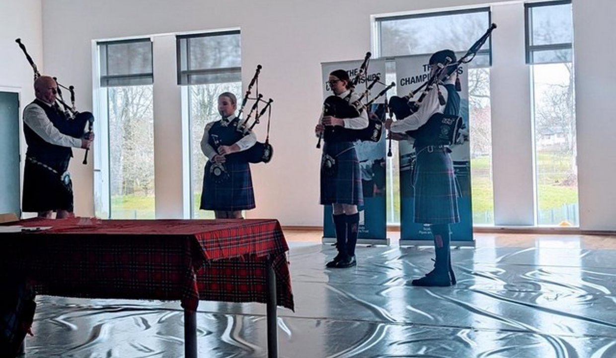 Pipers playing bagpipes