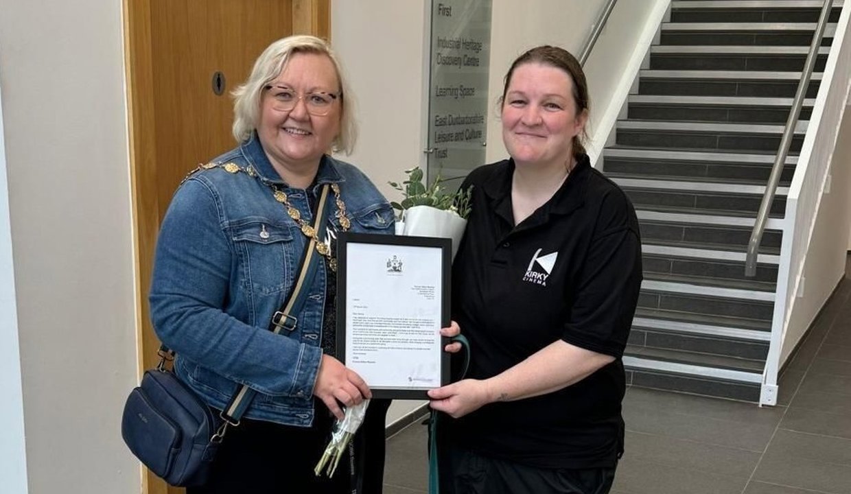 Provost Renwick and Cinema Manager Serina Marshall celebrate the opening