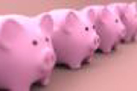four pink piggy banks in a row