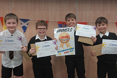 Winning Clober Primary pupils holding their certificates