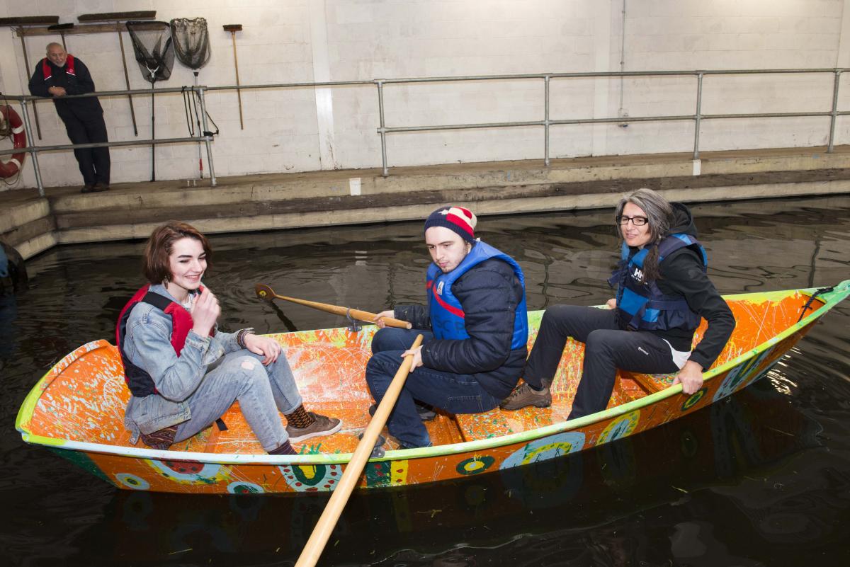 young people in boat