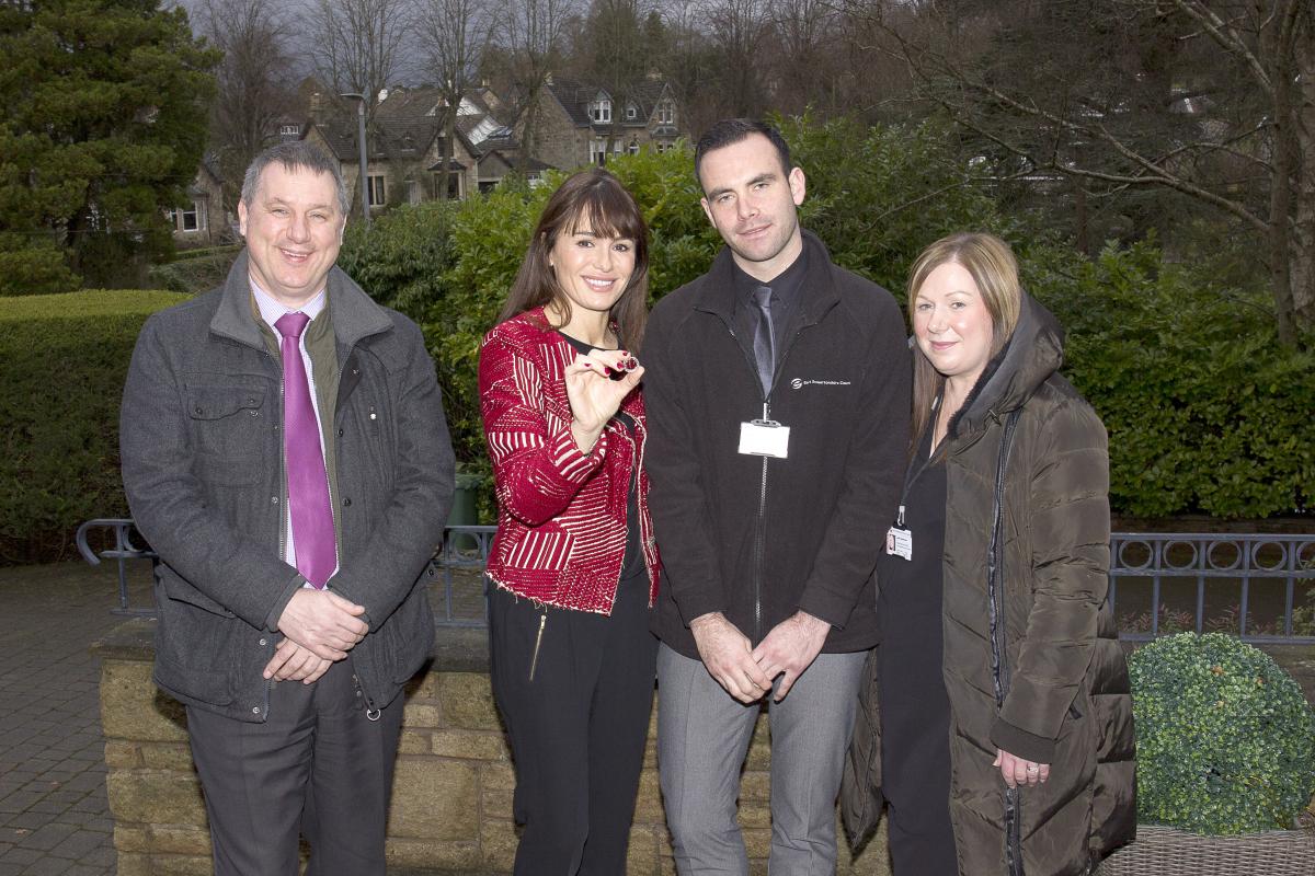 Pamela, Cllr McDonald and two volunteers with ring after diamond being found