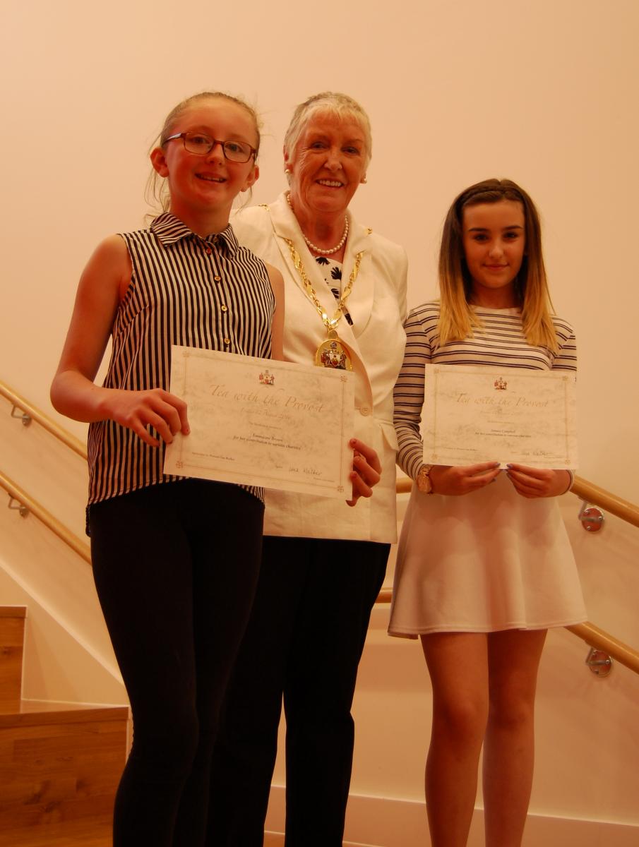 Provost with two school girls