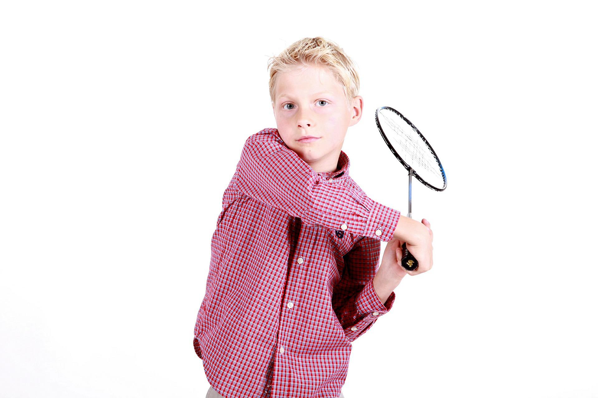 Boy playing badminton 