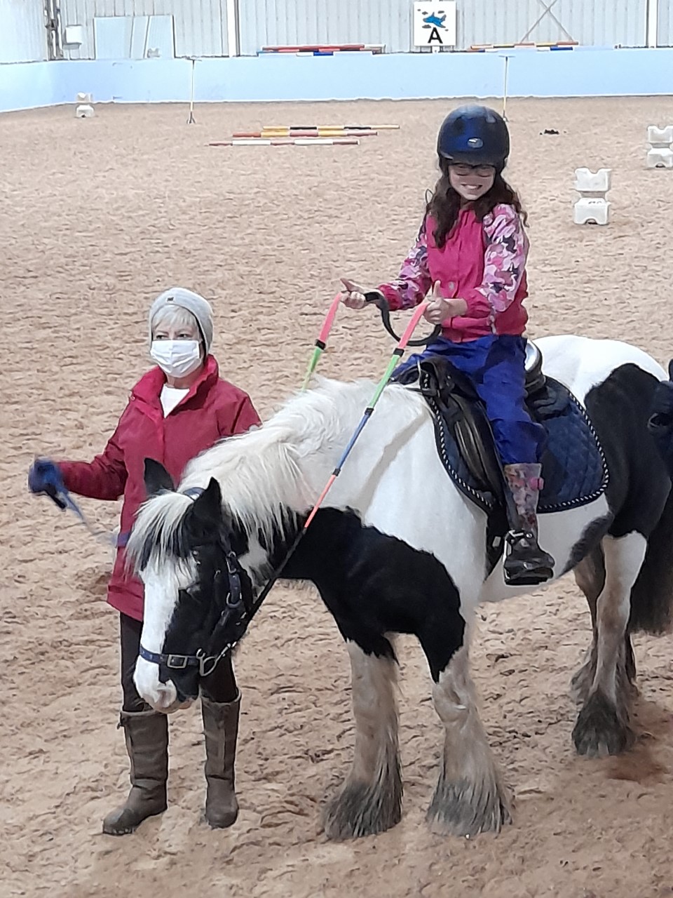 A photo of a pupil from Campsie View on a horse at the RDA stables in North Glasgow