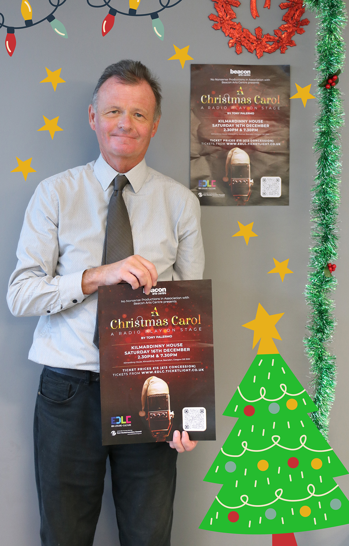 jim gibbons hold a chirstmas poster