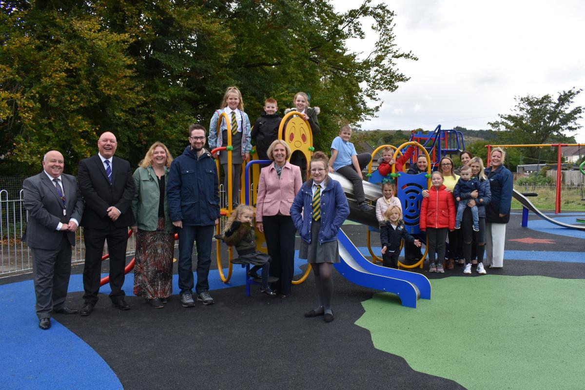 Councillors. St Machan's  Head Teacher and children along with community members