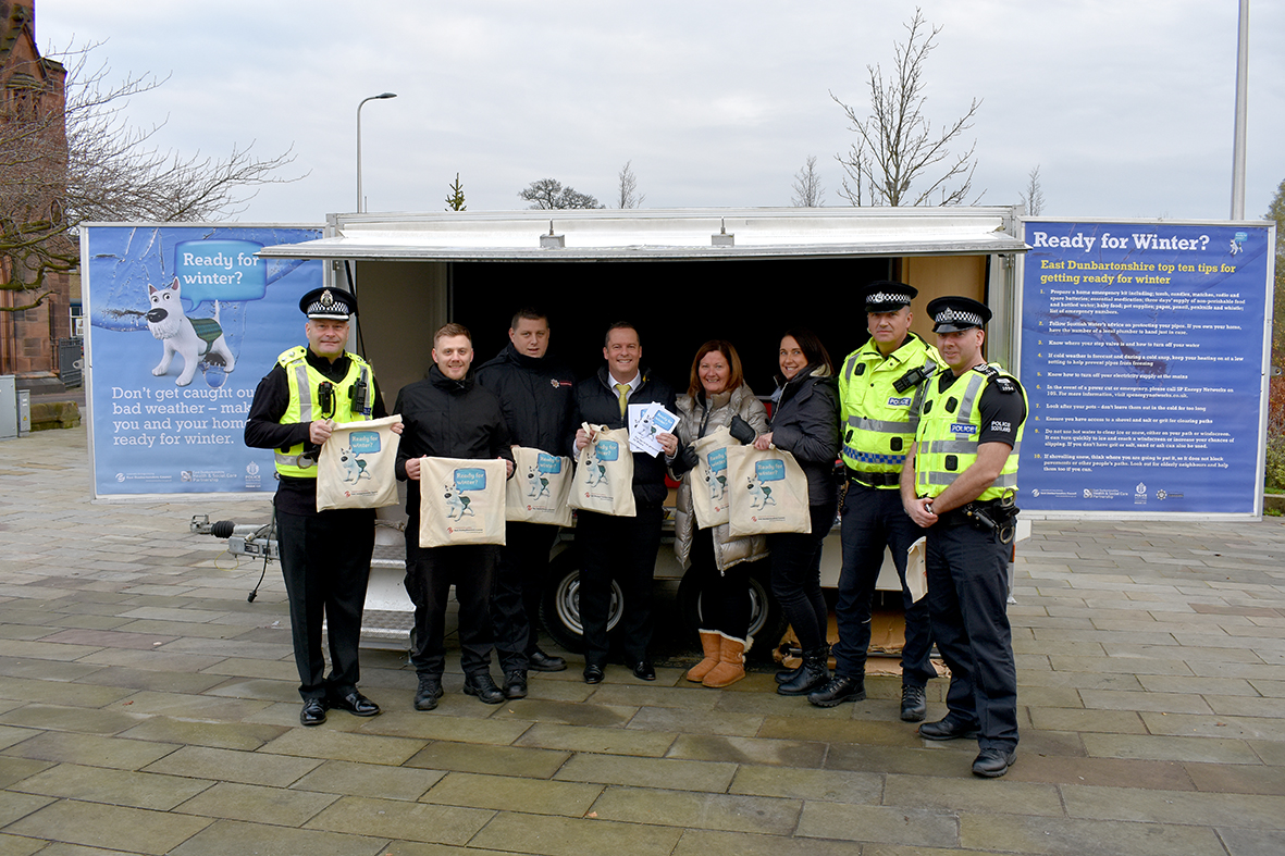 Police and EDC employees at Ready for Winter display