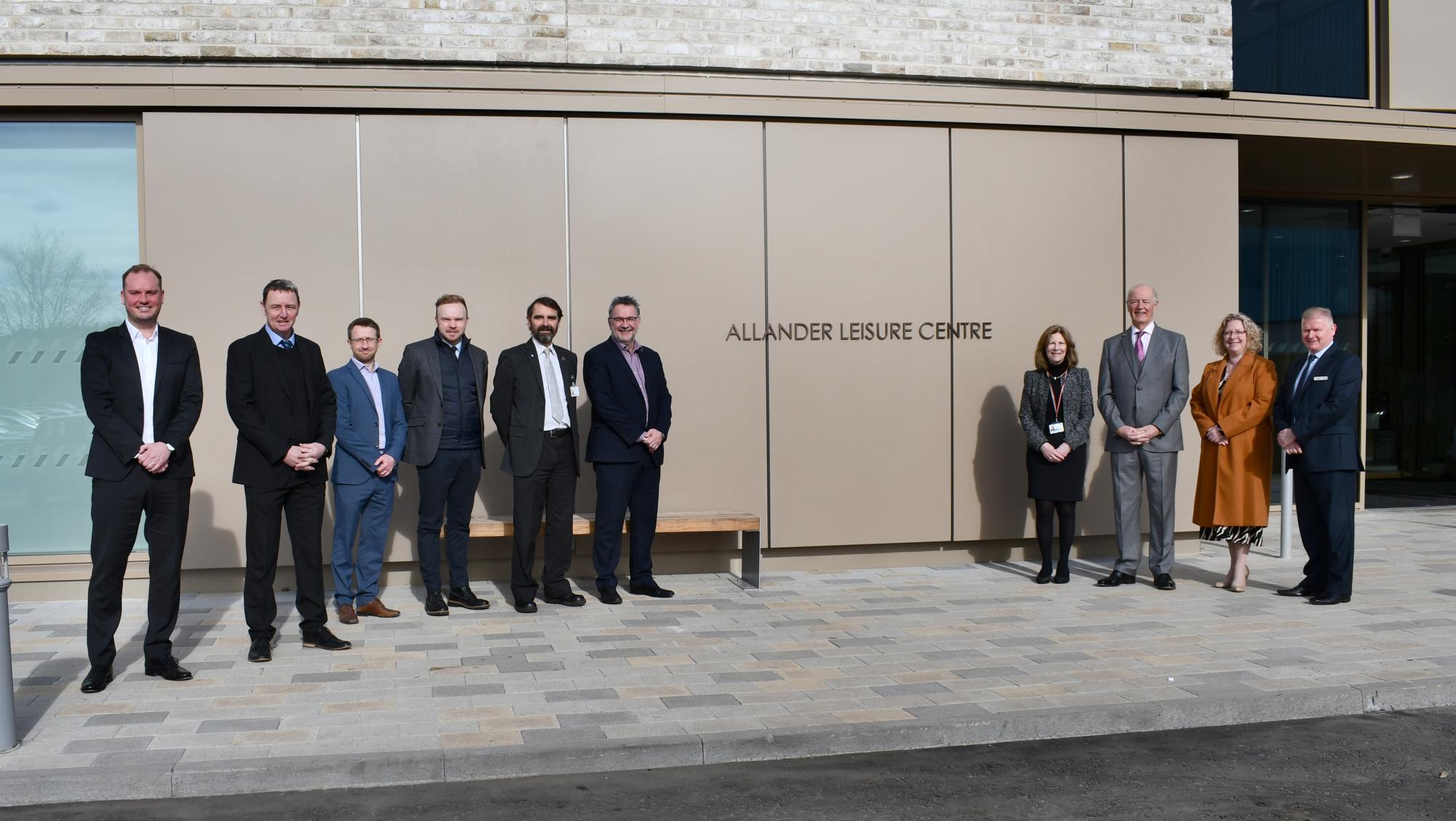 Councillor Gordan Low, Jim Neill and others outside the new Allander Leisure Centre